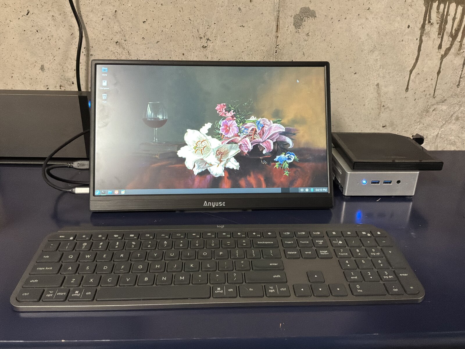 The basement server, driven from a cheap portable USB monitor and keyboard